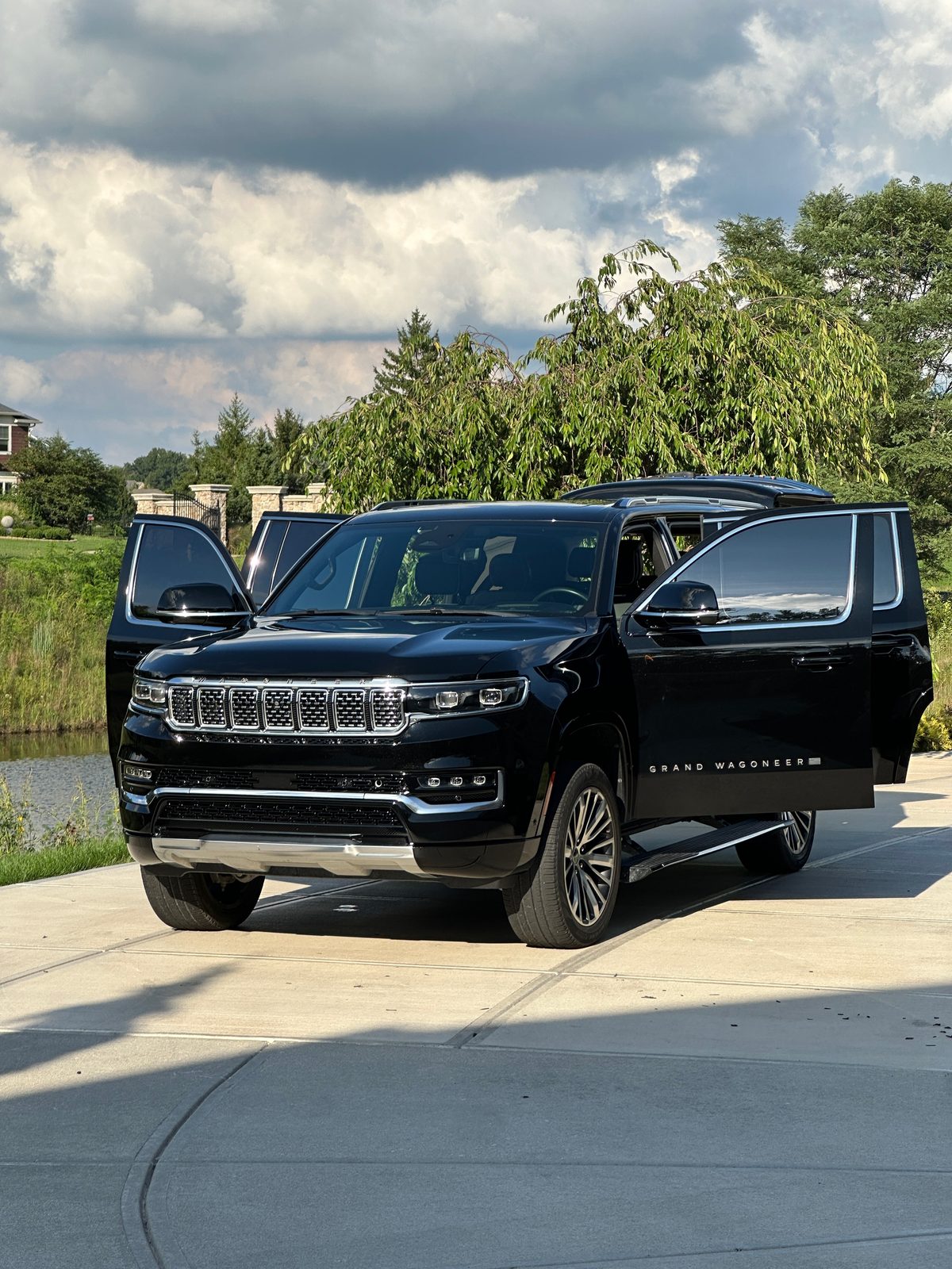 Vehicle with doors open showing power running boards